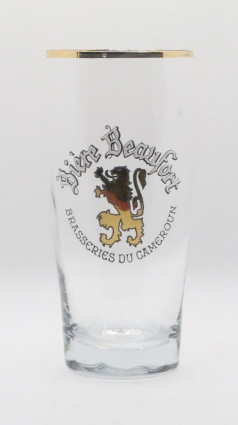 Ancien verre à bière Beaufort émaillé de la brasserie du Cameroun