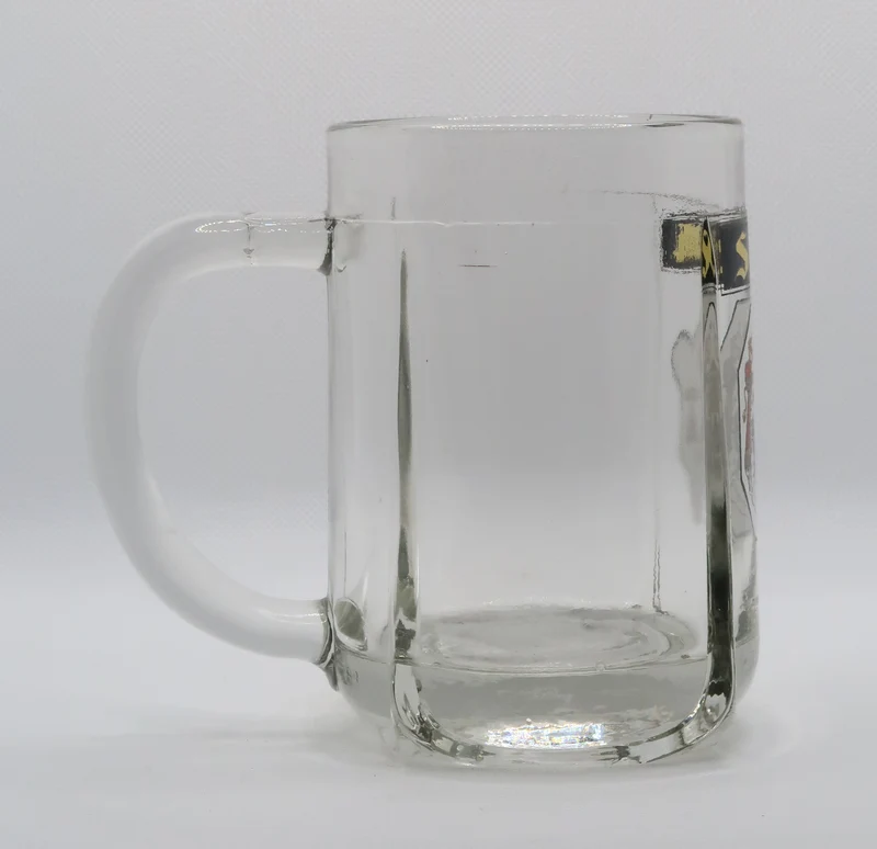Ancienne chope à bière émaillée Silva de la brasserie Champigneulles
