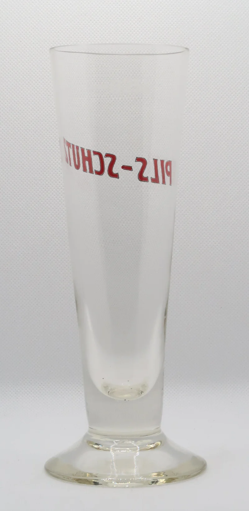 Ancienne verre à bière émaillé Pils Schutz de la brasserie Schuzenberger